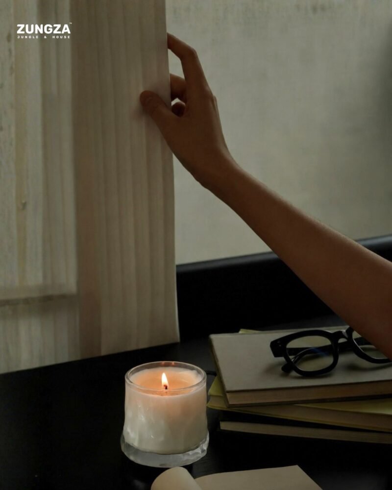 ZUNGZA Song Sanh glass candle burning on a table — Burning candles in a home with small children and pets